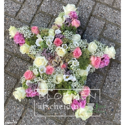 Ster van gemengde roze en witte bloemen